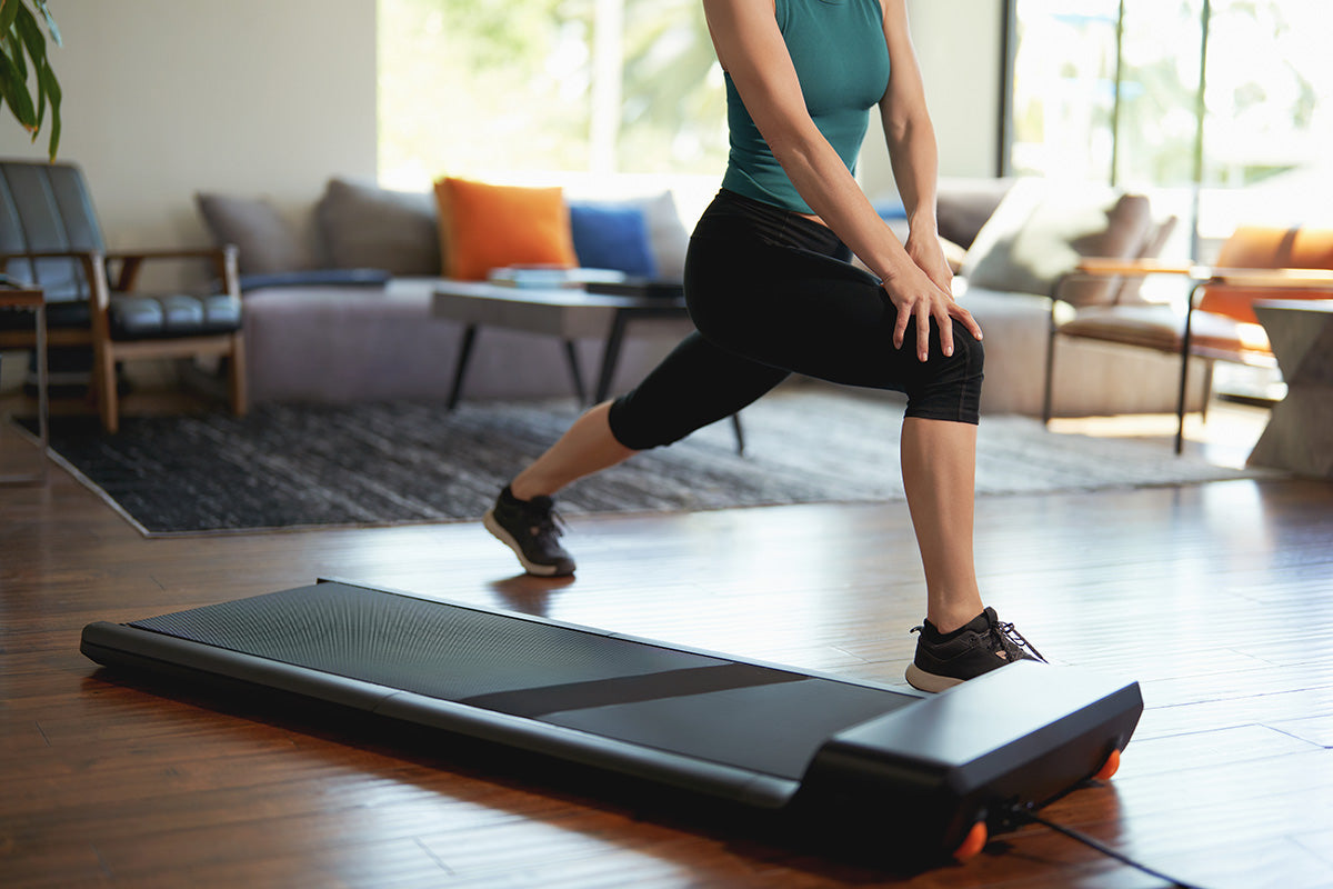 Stepper machine next to a WalkingPad treadmill