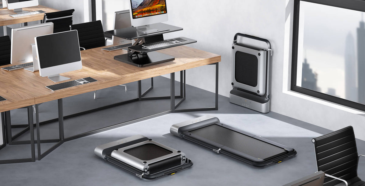 The three states of a folding treadmill: folded state, unfolded state, and storage state.