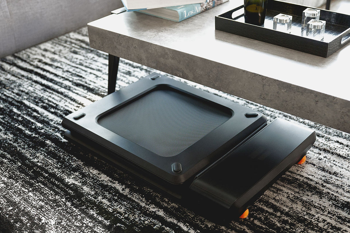 WalkingPad treadmill placed on a carpeted floor